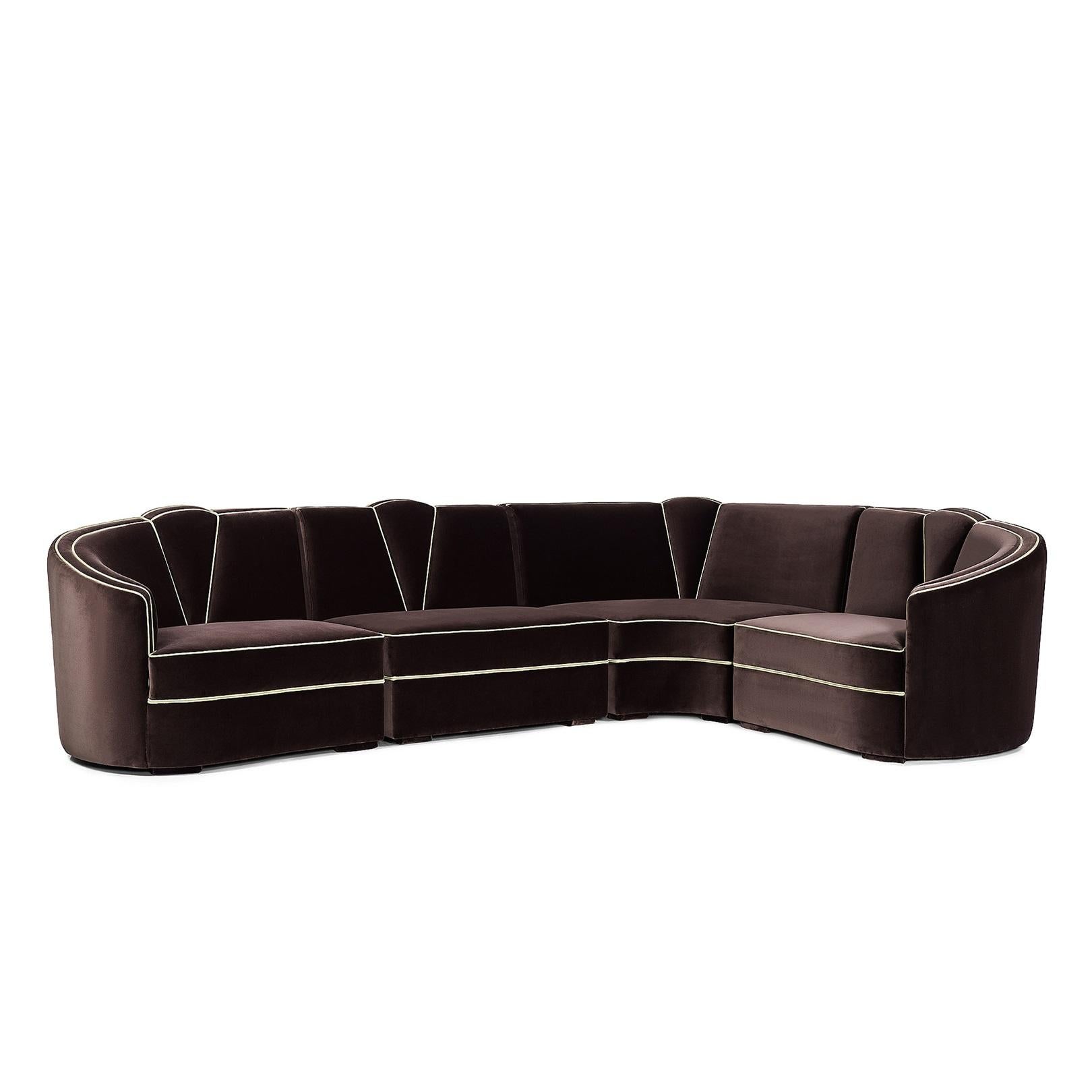 This sectional sofa features a wonderfully elegant fan-shaped motif, with its accentuated curvy lines with decadent and lavish finish. The feminine curves are ravishingly enhanced by the different colored toned piping.
Upholstery: velvet 
Feet: