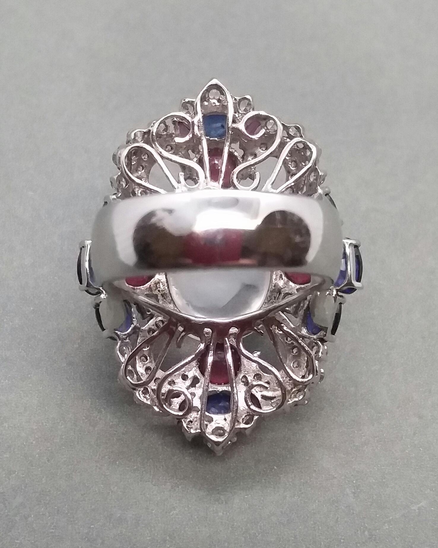 Mixed Cut Art Deco Style Moonstone Blue Sapphires Rubies Diamonds White Gold Cocktail Ring For Sale