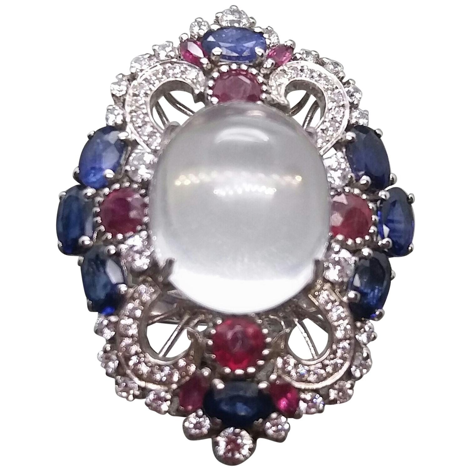 Art Deco Style Moonstone Blue Sapphires Rubies Diamonds White Gold Cocktail Ring For Sale