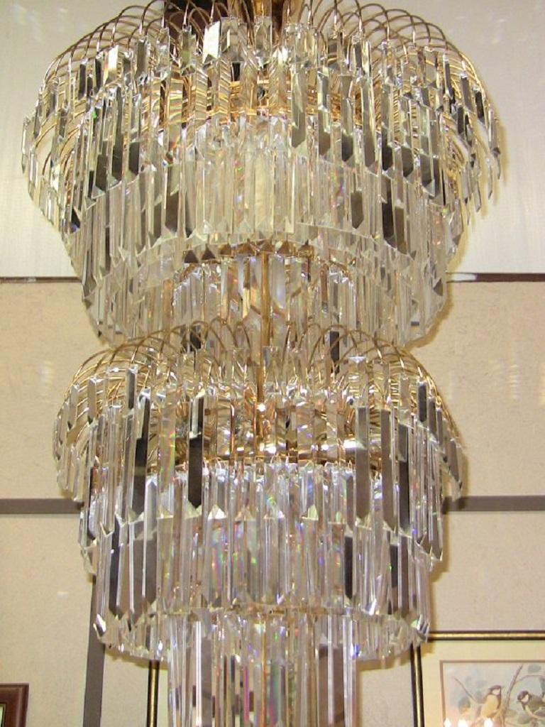 Absolutely stunning extra large Art Deco style chandelier from the mid-20th century.
Multi – layered in gorgeous Swarofski crystal!

There are in the region of 1,000 pieces of crystal on this chandelier!
The outer layer on each level consists of