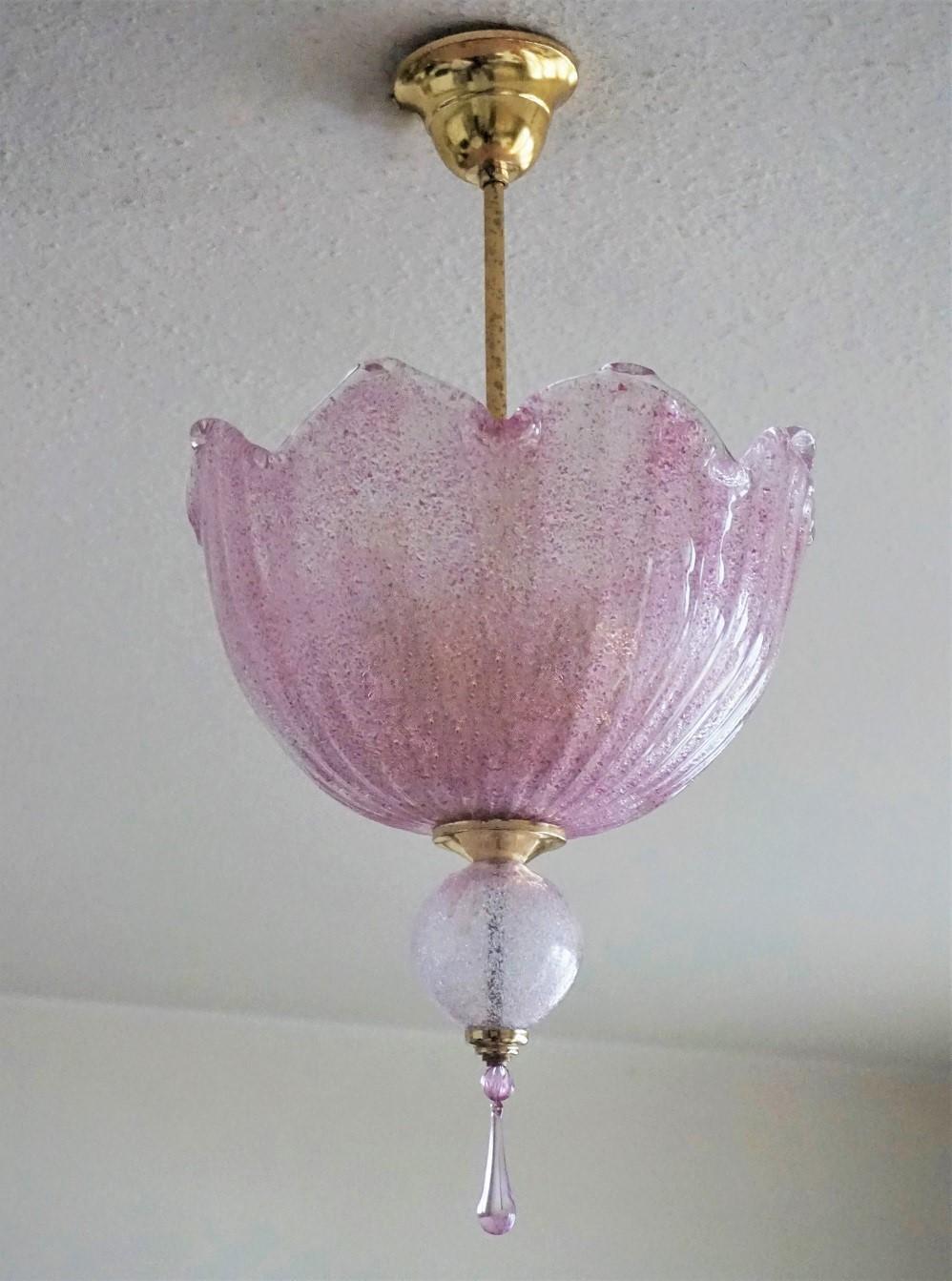 A lovely Murano pink glass two-light chandelier or lantern gilt brass mounted, Italy, 1960s. It takes two E27 light bulbs.
Measures:
Height 23.25