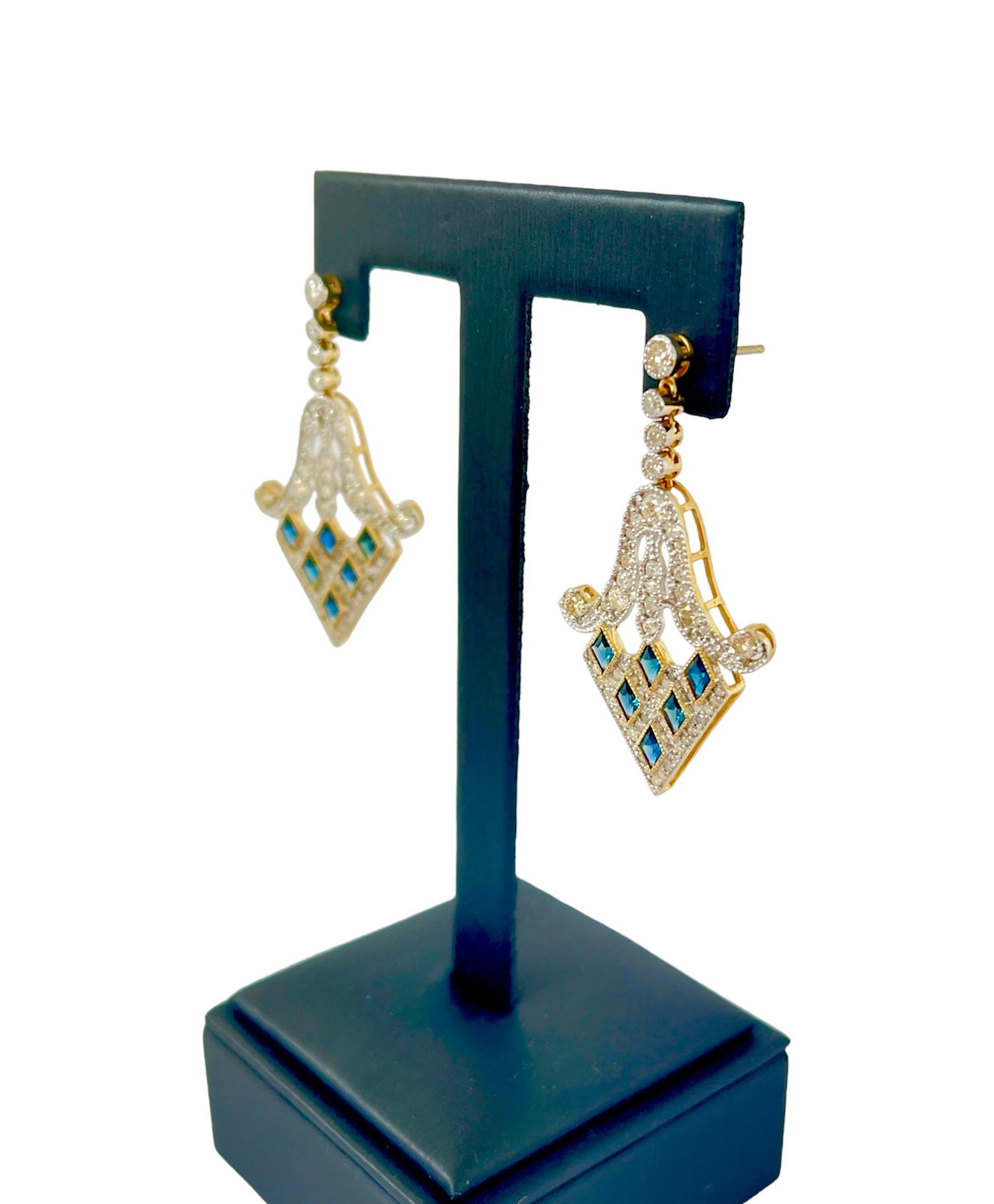 These earrings are truly fit for Royalty! They are set with over 1.50ct in Diamonds.
The design is fashioned on earrings from the Art Deco period when Chevrons and Geometric designs ruled! Crafted in 9ct Yellow Gold and set with natural Diamonds and