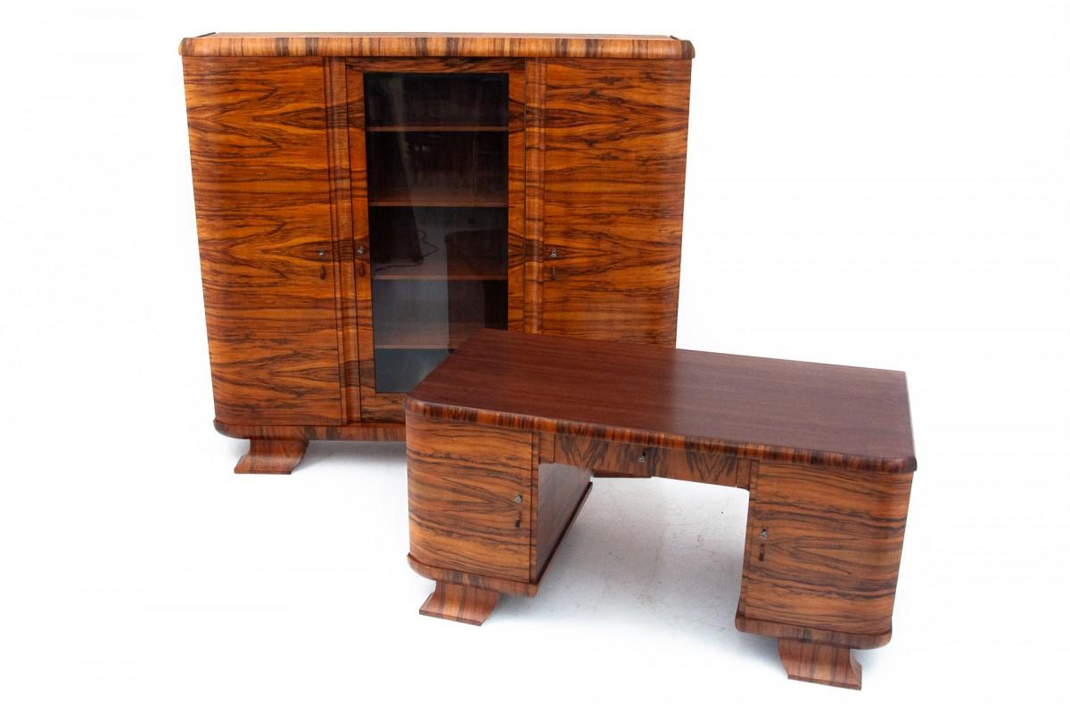 An Art Deco style office set from the 1930s.

Furniture in very good condition, after professional renovation.

Dimensions:

Library: height 185 cm / width 200 cm / depth 41 cm

Desk: height 78 cm / width 160 cm / depth 80 cm / footwell: height 61