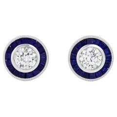 Borchie in oro bianco 14 carati con diamante e zaffiro aureolato, in stile Art Deco.