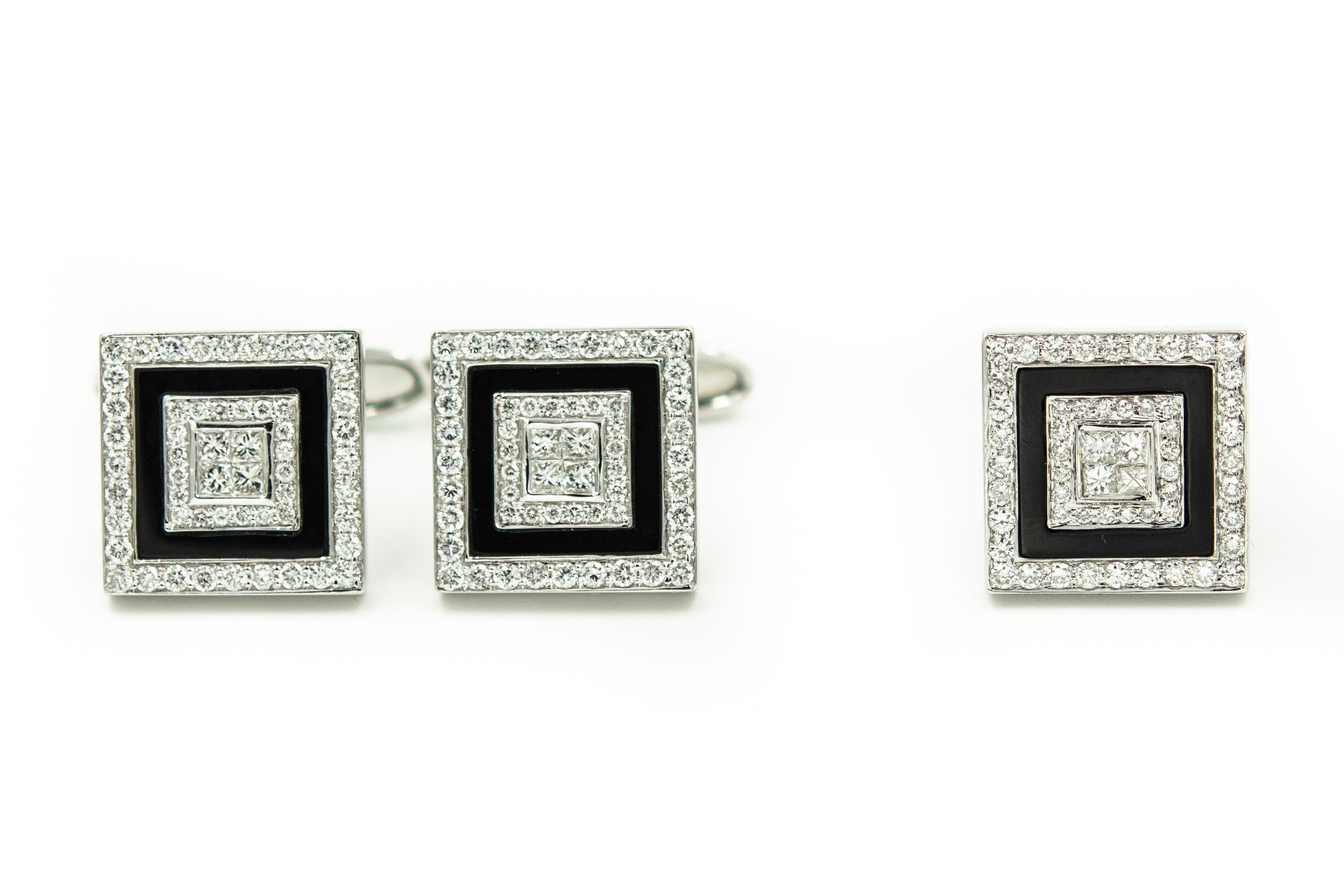 These elegant art deco style 18k white gold square cufflinks and tie-tac feature a center section with 4 princess cut diamonds with an outer border of 20 round diamonds in each piece followed by an onyx frame concluding with another round diamond