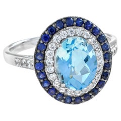 Art Deco Style Oval Blue Topaz Blue Sapphire Diamond Double Halo White Gold Ring