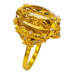 Anello da cocktail in oro giallo con diamante bianco e citrino taglio ovale in stile Art Deco