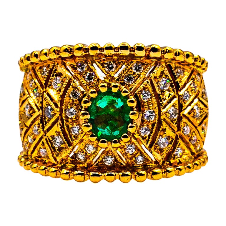 Art Deco Style Oval Cut Emerald White Diamond Yellow Gold Cocktail Ring For Sale