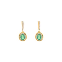 Boucles d'oreilles pendantes en or jaune 14k de style Art Déco avec émeraude ovale et diamant