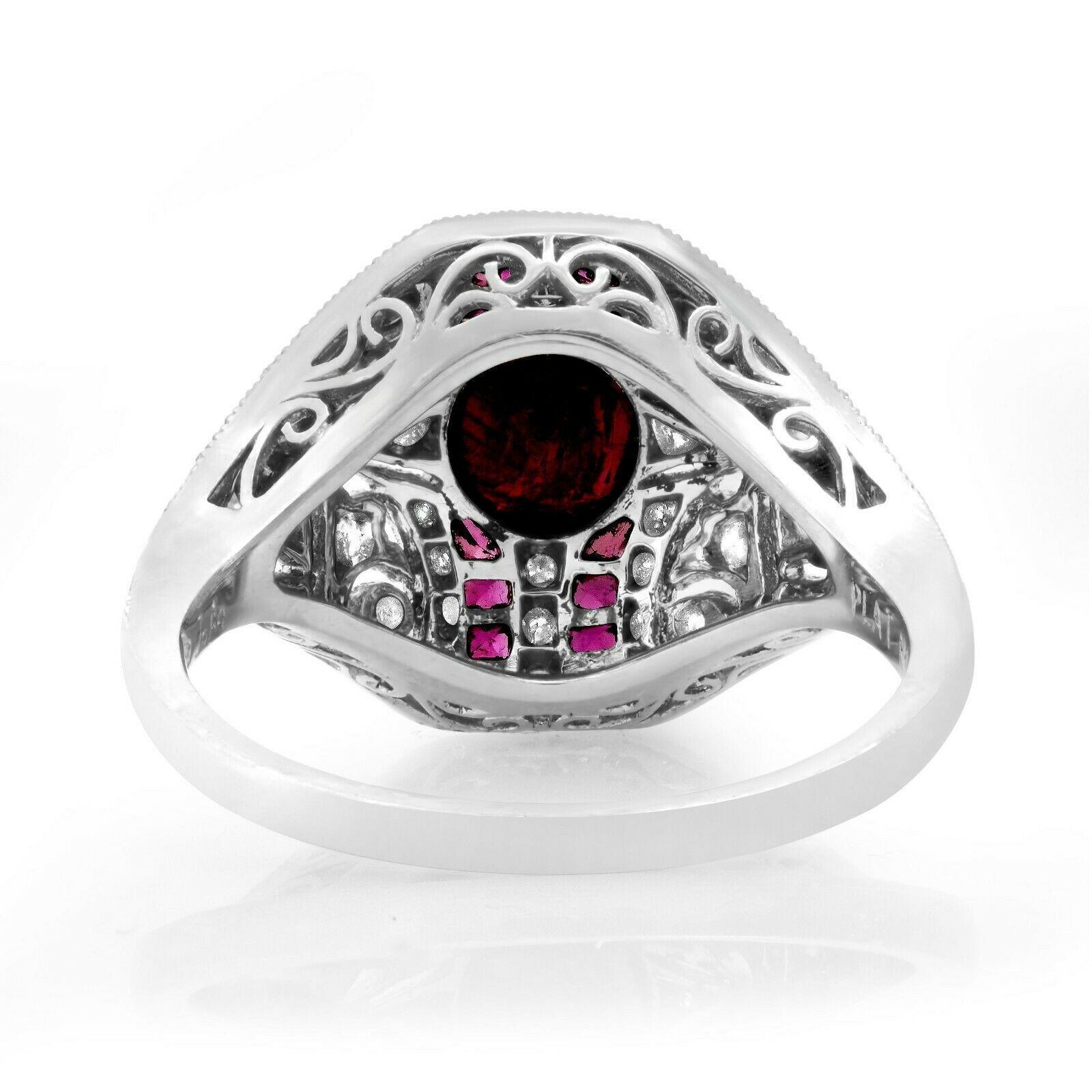 Ruby (1.05 total carat weight) and diamond (0.49 total carat weight) antique inspired cocktail ring in 900 platinum. The ring is designed and handmade locally in Los Angeles by Sage Designs L.A. using earth-mined and conflict free diamonds and