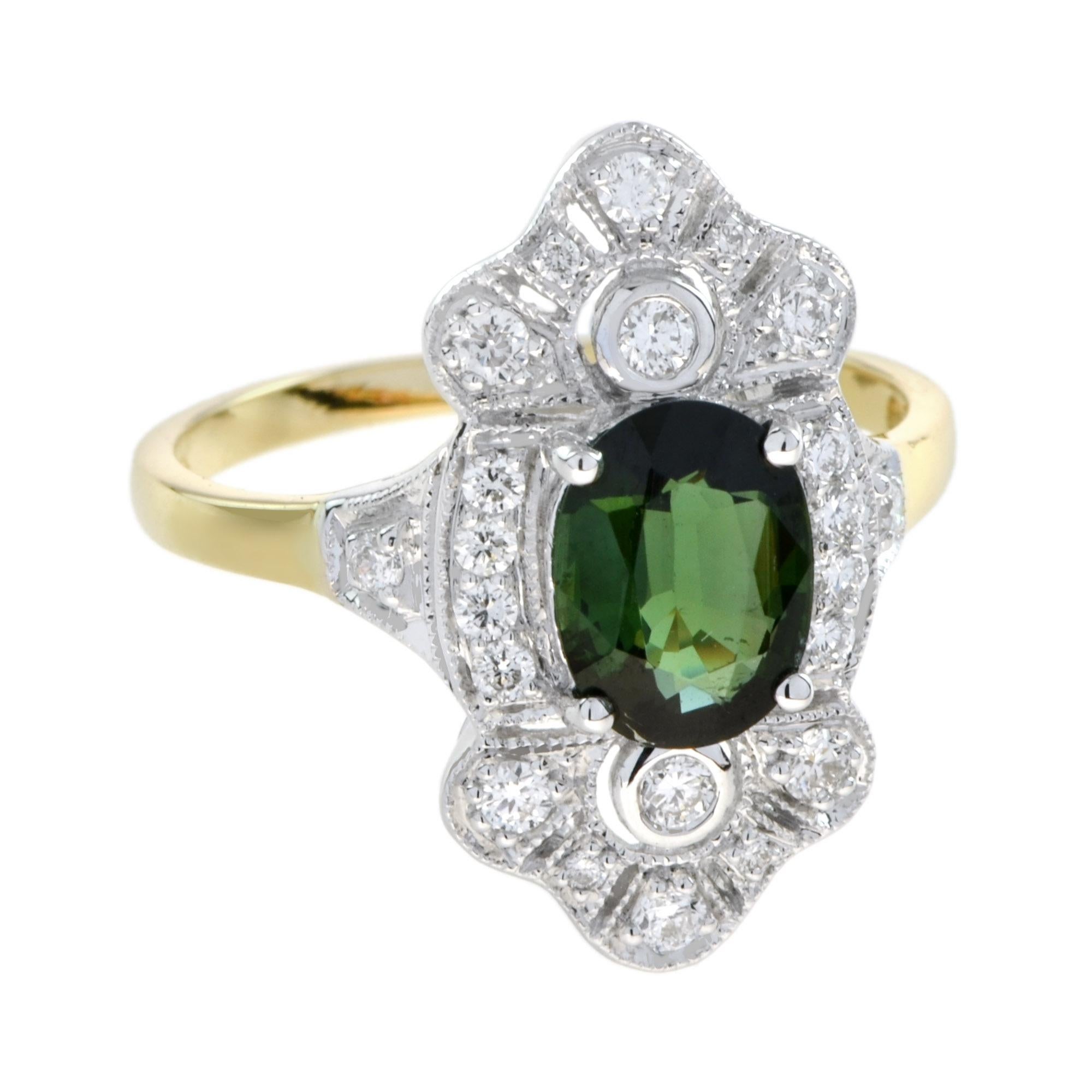 Vintage styling in a yellow gold ring, with very fine twist-wire work and leaf motifs, bezel set with a beautiful green tourmaline and diamonds accent. 14K Gold. 
Ring Information
Style: Art-deco
Total weight: 4.80 g. (approx. total weight)
Center