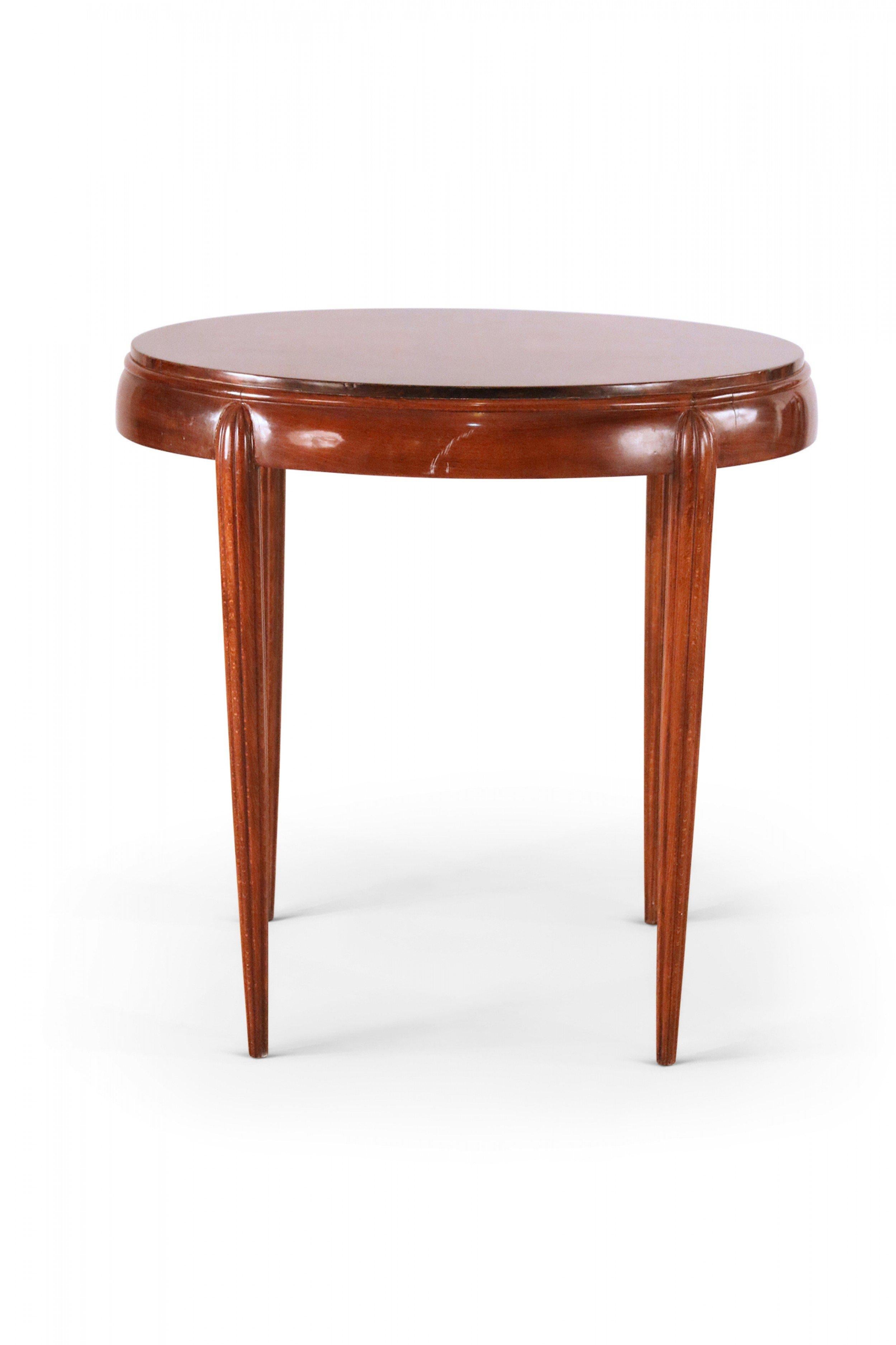 Vintage Art Deco-style oval mahogany side / end table with four tapered partially fluted legs.
  