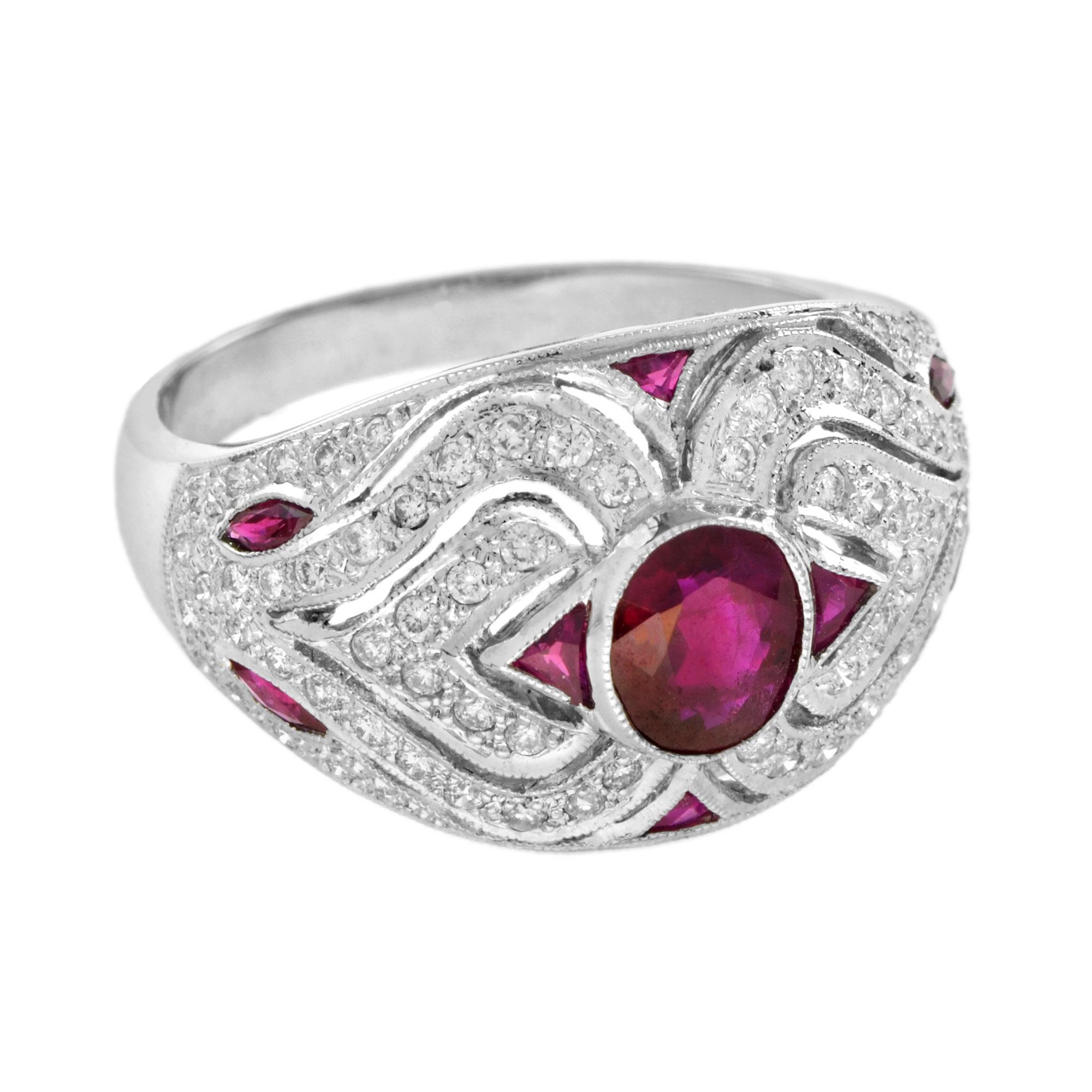 A bold ruby and diamond vintage inspired ring as it could be worn as a right hand ring or as engagement ring. Centering an oval cut ruby weighting 0.65 carat. The setting is made of solid 18k white gold and every surface has been intricately