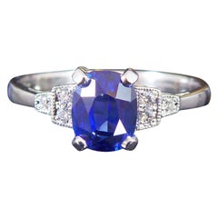 Art Deco Style Oval Sapphire Solitaire Ring Diamond Shoulders and Platinum Band