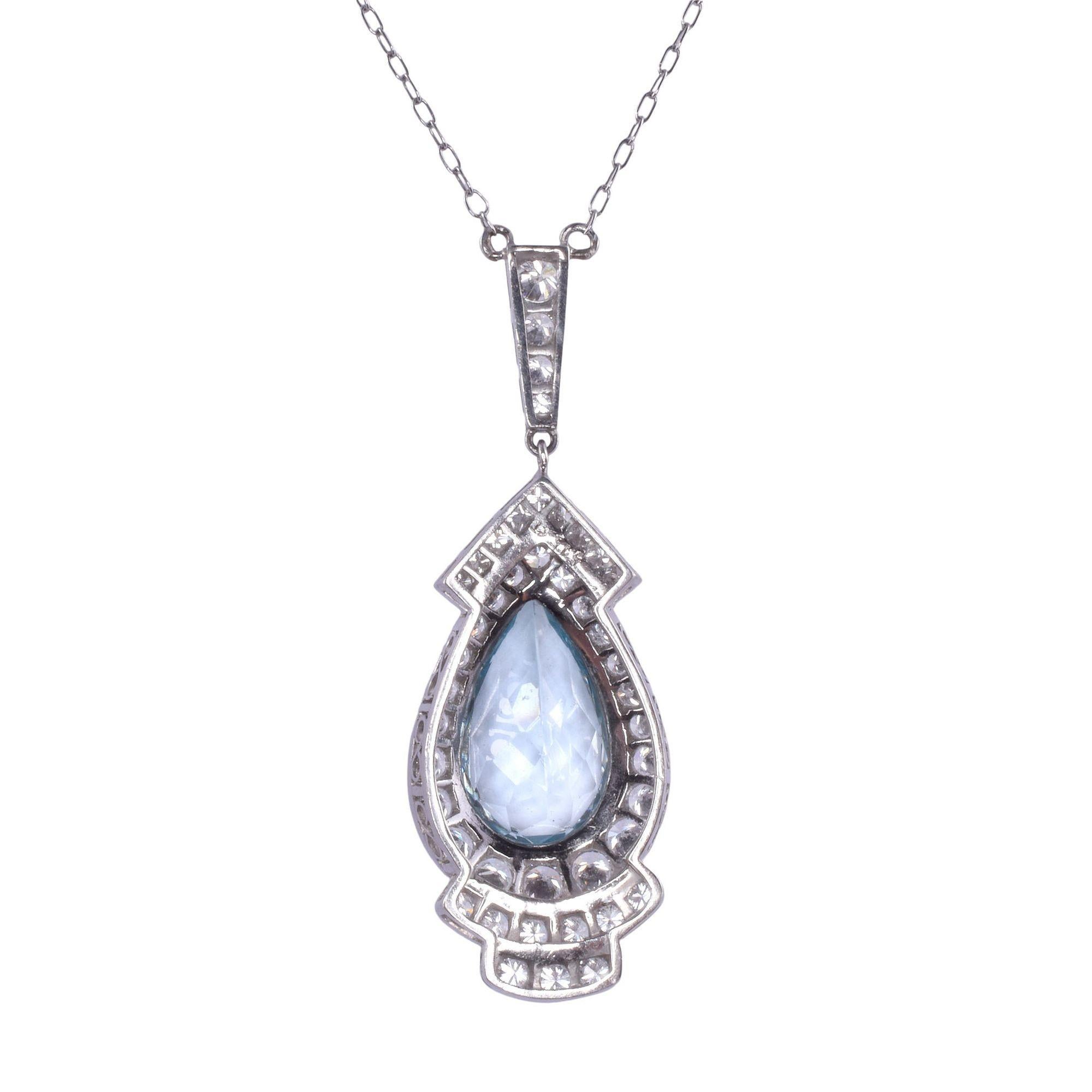 Estate Art Deco style pear aquamarine & diamond platinum necklace. This Art Deco style necklace is crafted in platinum and features a 5.15 carat pear aquamarine accented with 9 princess cut diamonds at .50 carat total weight along with 35 round