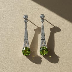 Orecchini a goccia in stile Art Deco con peridoto e topazio incolore argento, oro