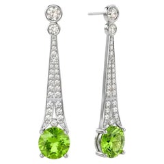 Orecchini a goccia in stile Art Deco con peridoto e topazio incolore argento, oro