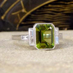 Art Deco Style Peridot Ring with Diamond Set Shoulder in Platinum
