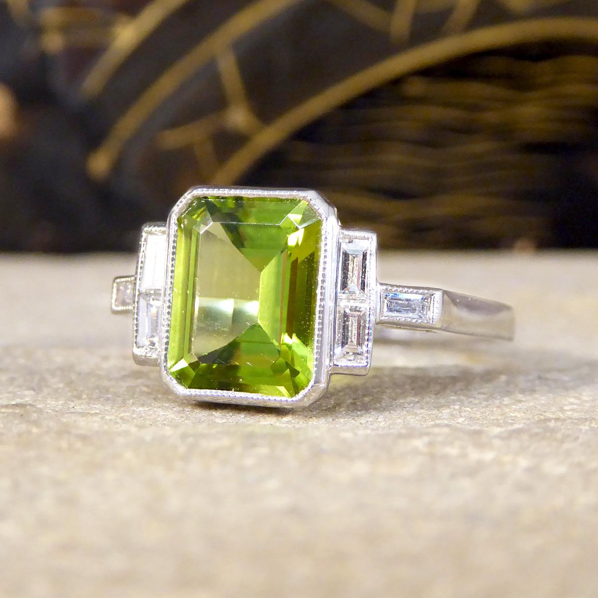 Emerald Cut Art Deco Style Peridot Ring with Diamond Set Shoulder in Platinum For Sale