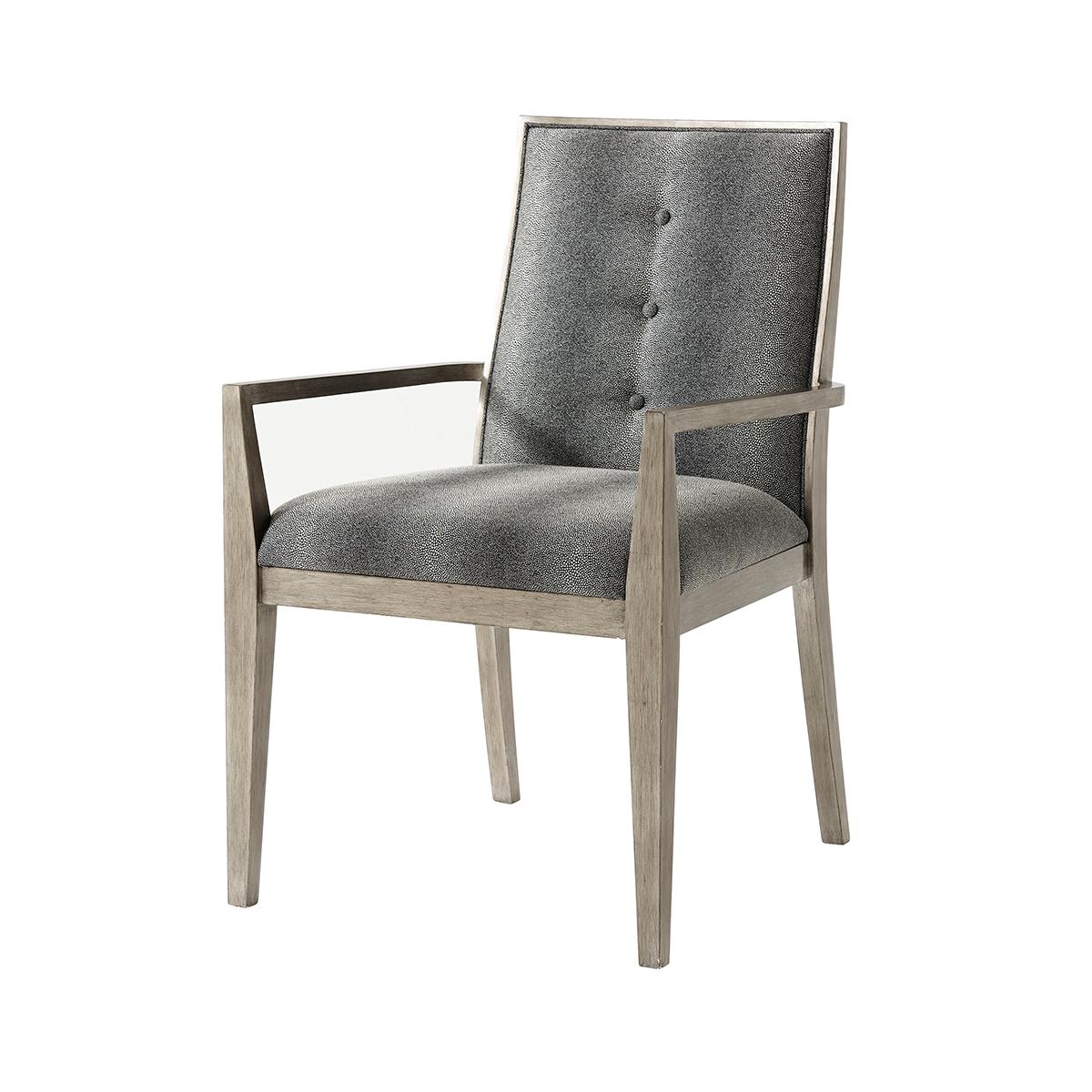 Two Dining armchairs with a hand-brushed pewter finish, with an upholstered back, outside back and seat on square tapered legs. 

Dimensions: 23