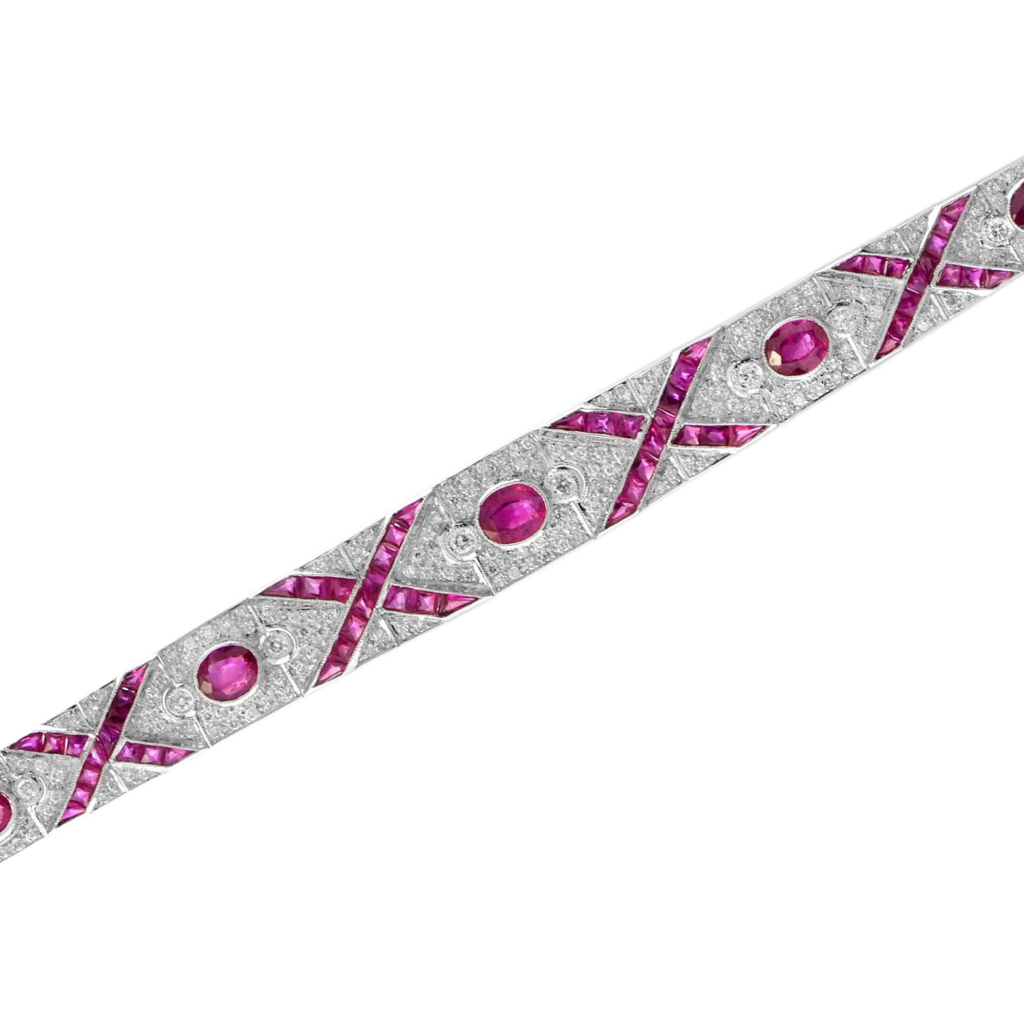 This stunning, fine and impressive antique style ruby bracelet with diamonds is crafted in 18k white gold. The fully articulated bracelet is composed of eight oval rubies and French cut 112 rubies with 292 H-J/SI round brilliant cut diamonds. This