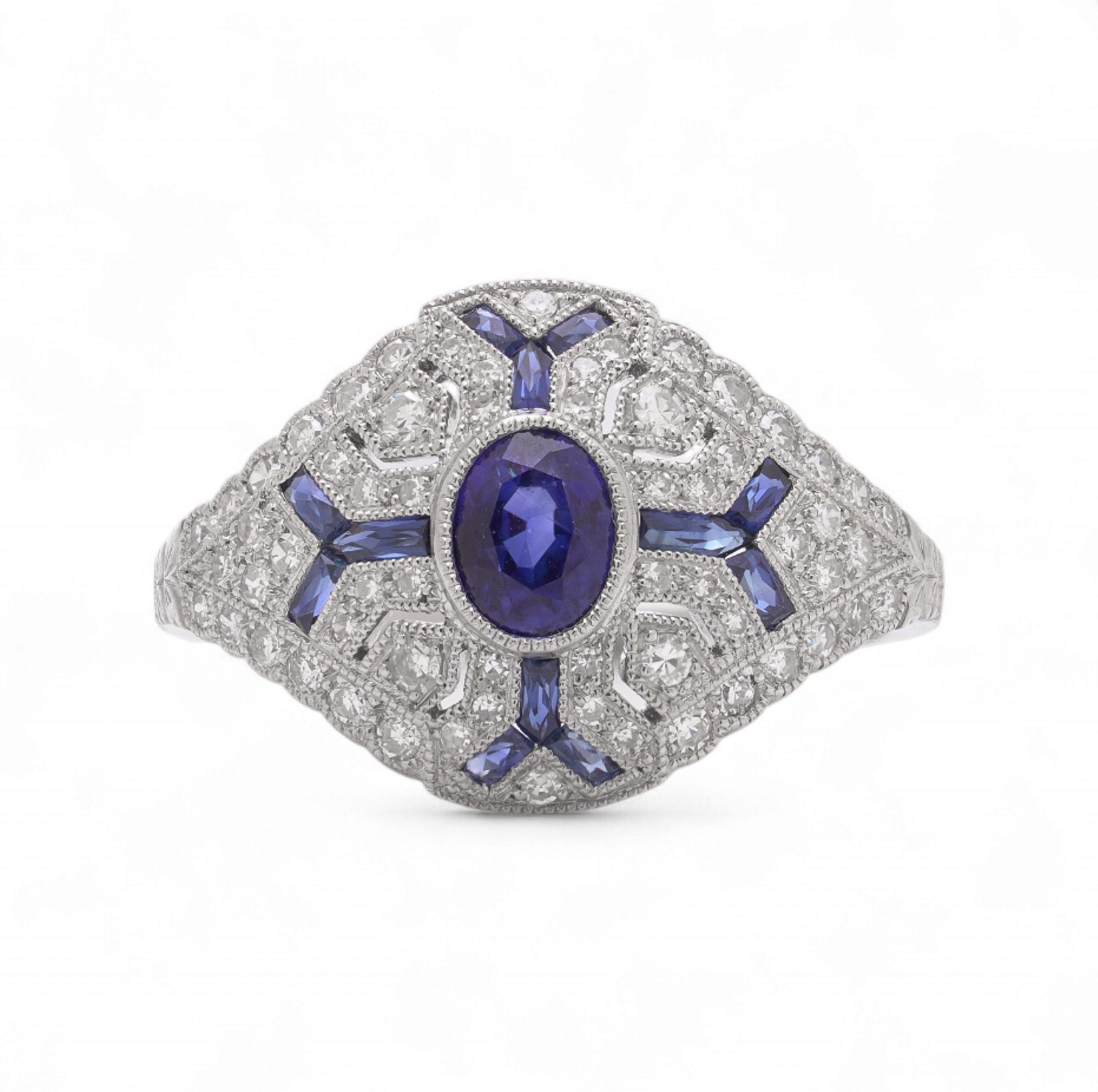 Taglio ovale Stile Art Deco in platino da 0,74 carati. Anello con zaffiro e diamante in vendita