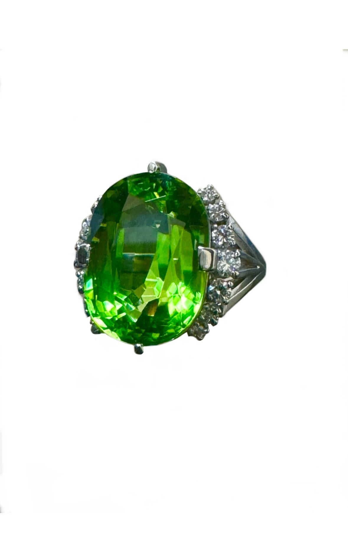 Oval Cut Art Deco Style Platinum Diamond 17 Carat Burmese Peridot Engagement Ring For Sale
