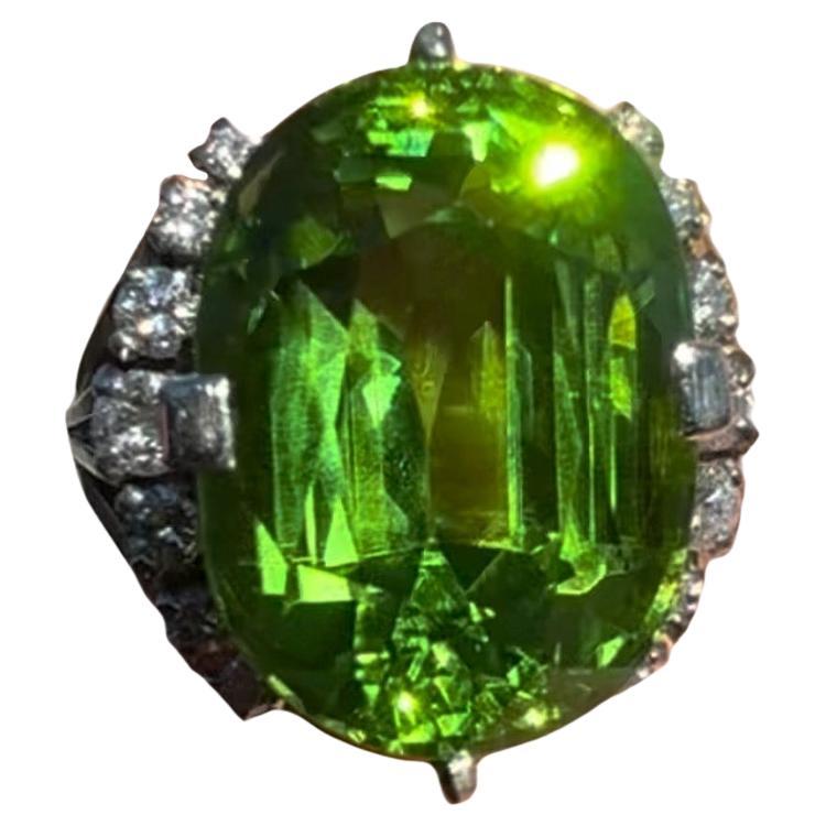 Art Deco Style Platinum Diamond 17 Carat Burmese Peridot Engagement Ring For Sale