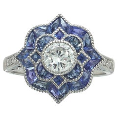 Art Deco Style Platinum Diamond and Calibre Sapphire Star Cluster Ring