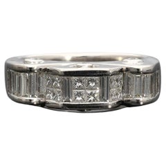 Art Deco Style Platinum Ring with Baguette, Princess, and Round Cut Diamonds