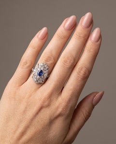 Art Deco Style Platinum Sapphire and Diamond Pierced Shield Ring