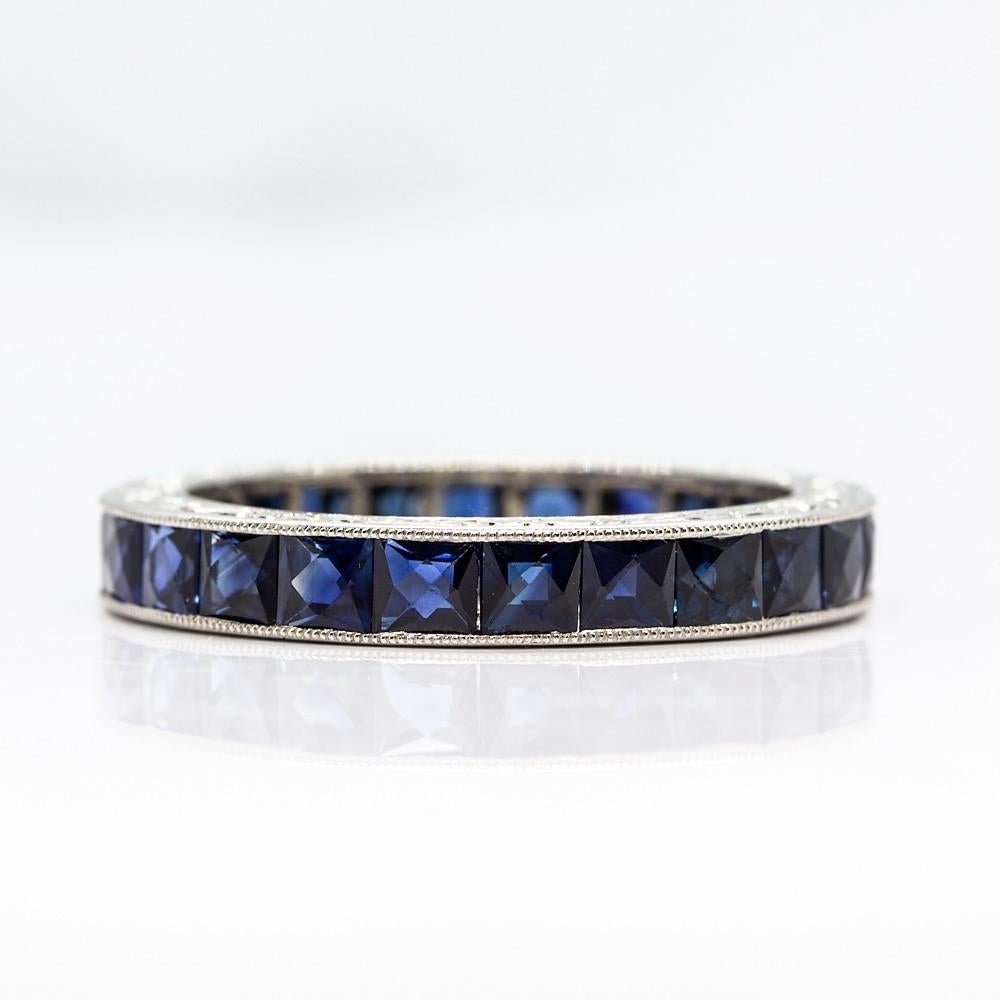 This is a lovely piece of jewelry that displays an Art Deco style.
30 natural French cut sapphires that weigh 5.80ctw constitute the flawless stones of this unique ring.
This is an exquisite eternity ring that was handmade in solid platinum.
Ring