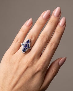 Art Deco Style Platinum Three Stone Sapphire and Diamond Navette Ring