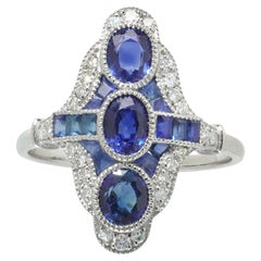 Art Deco Style Platinum Three Stone Sapphire and Diamond Navette Ring
