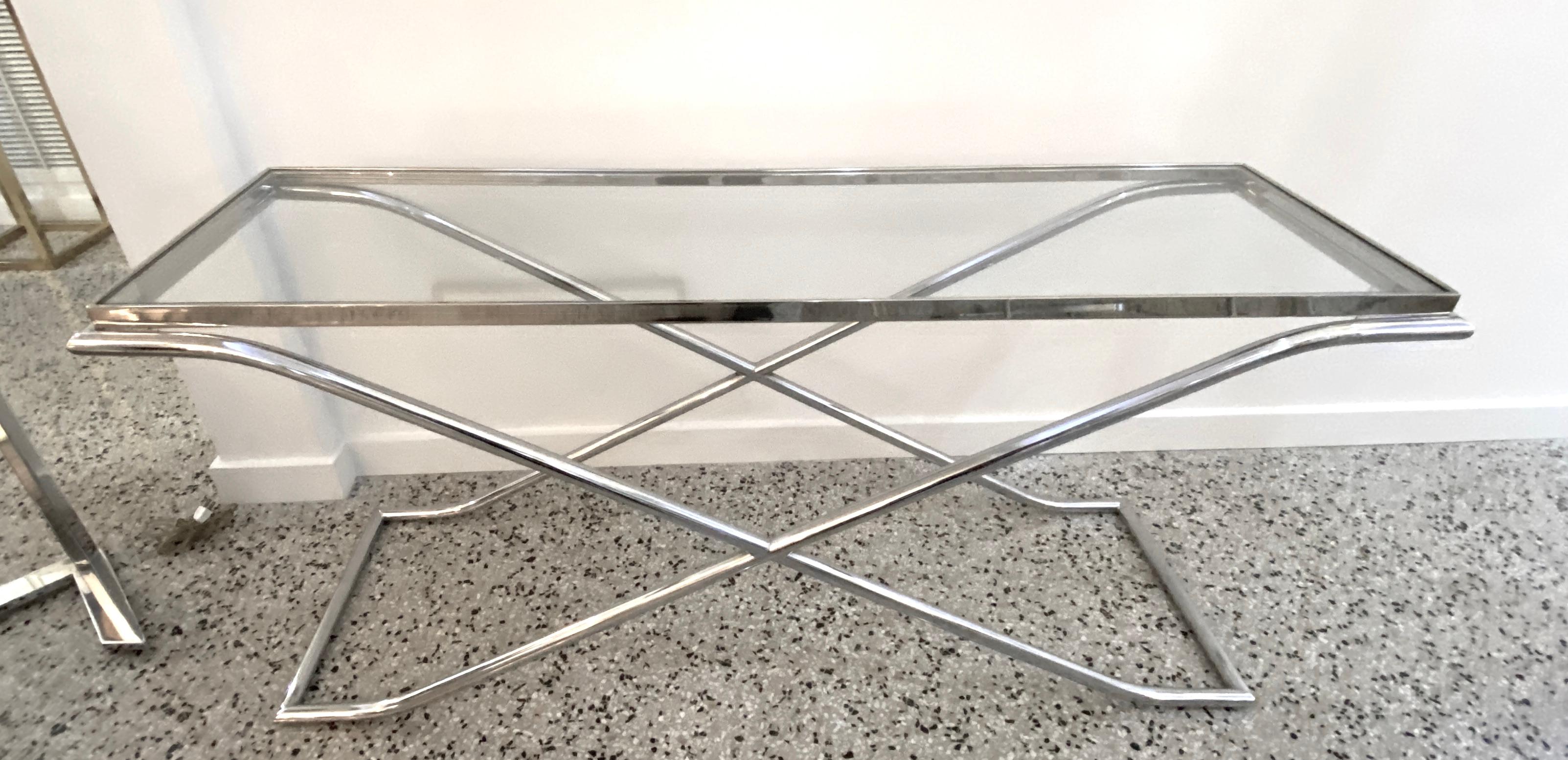 This stylish Art Deco inspired console table was recently acquired from a Palm Beach estate and will make the perfect understated piece for your home.