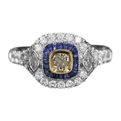 Anillo Estilo Art Decó Oro Blanco 18 Kilates Zafiro Azul y Diamante Amarillo Claro