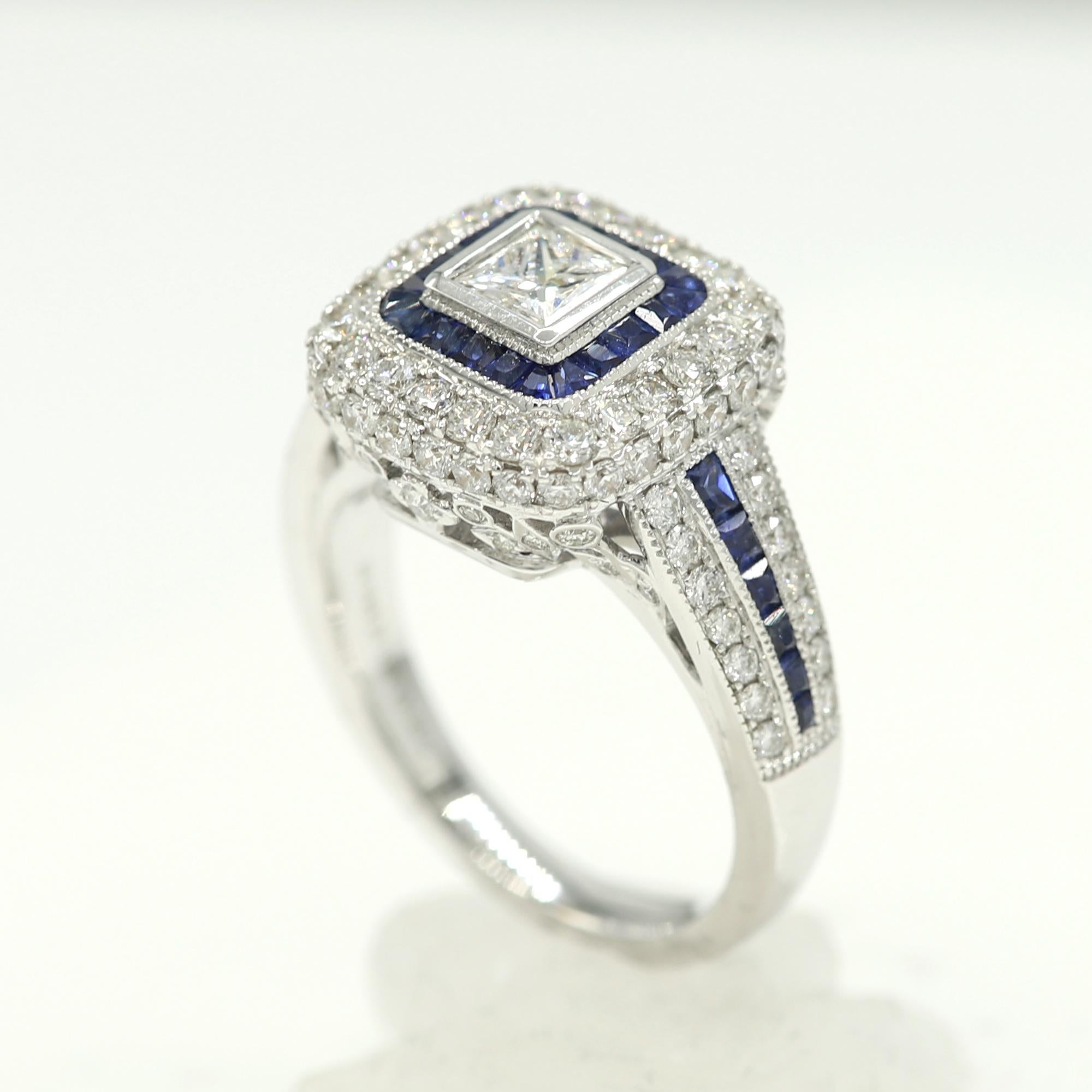 Brilliant Art Deco Style Ring. 18k White Gold 9.80 grams. Total all Diamonds 1.73 carat (center stones is princess cut Diamond 0.41 carat) Blue sapphire total 0.80 carat. overall design area size on the top is 13 x 13 mm. Finger size 7.
diamond are