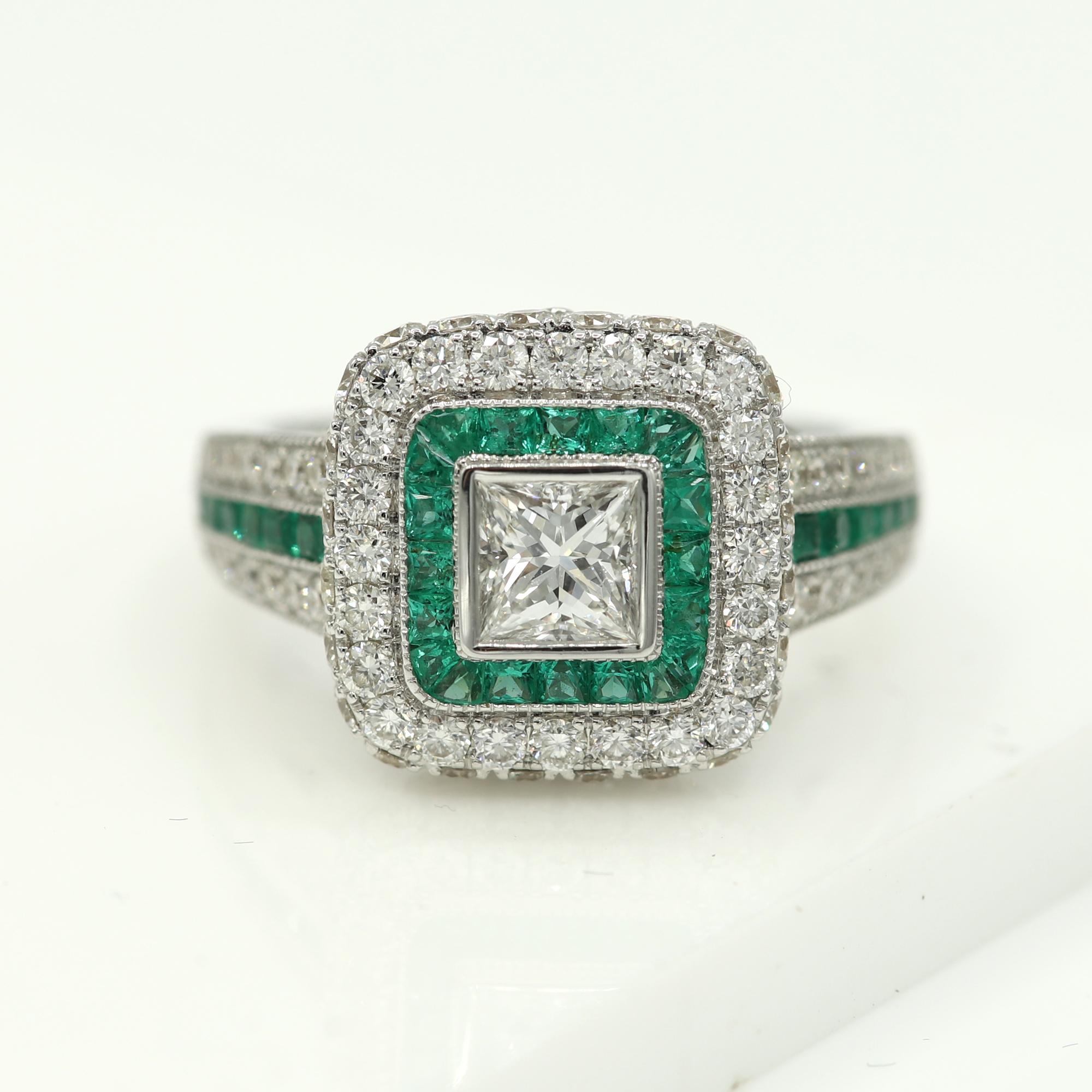 Brilliant Art Deco Style Ring. 18k White Gold 9.70 grams. Total all Diamonds 2.10 carat (center stones is princess cut Diamond 0.56 carat) Emeralds total 0.97 carat. overall design area size on the top is 13 x 13 mm. Finger size 7.
diamond are HI-SI