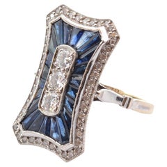 Art déco style ring with 51 diamonds and 22 sapphires
