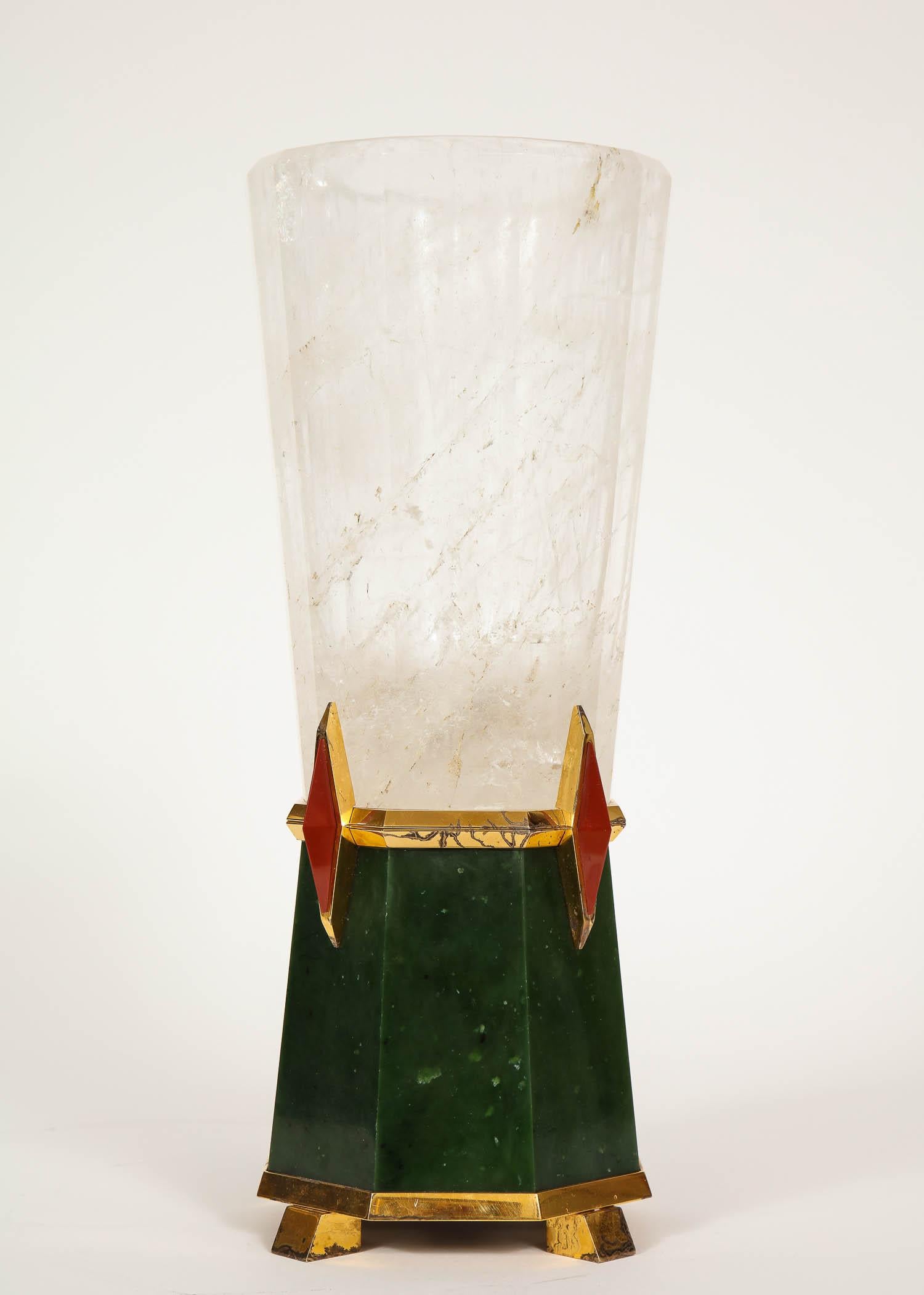 A very unusual Art Deco style, gilt silver, hand-carved rock crystal, red and green Russian Jasper mounted table lamp; by Asprey of London. This magnificently hand-carved rock crystal lamp is made with exceptional precision. Each section of the rock