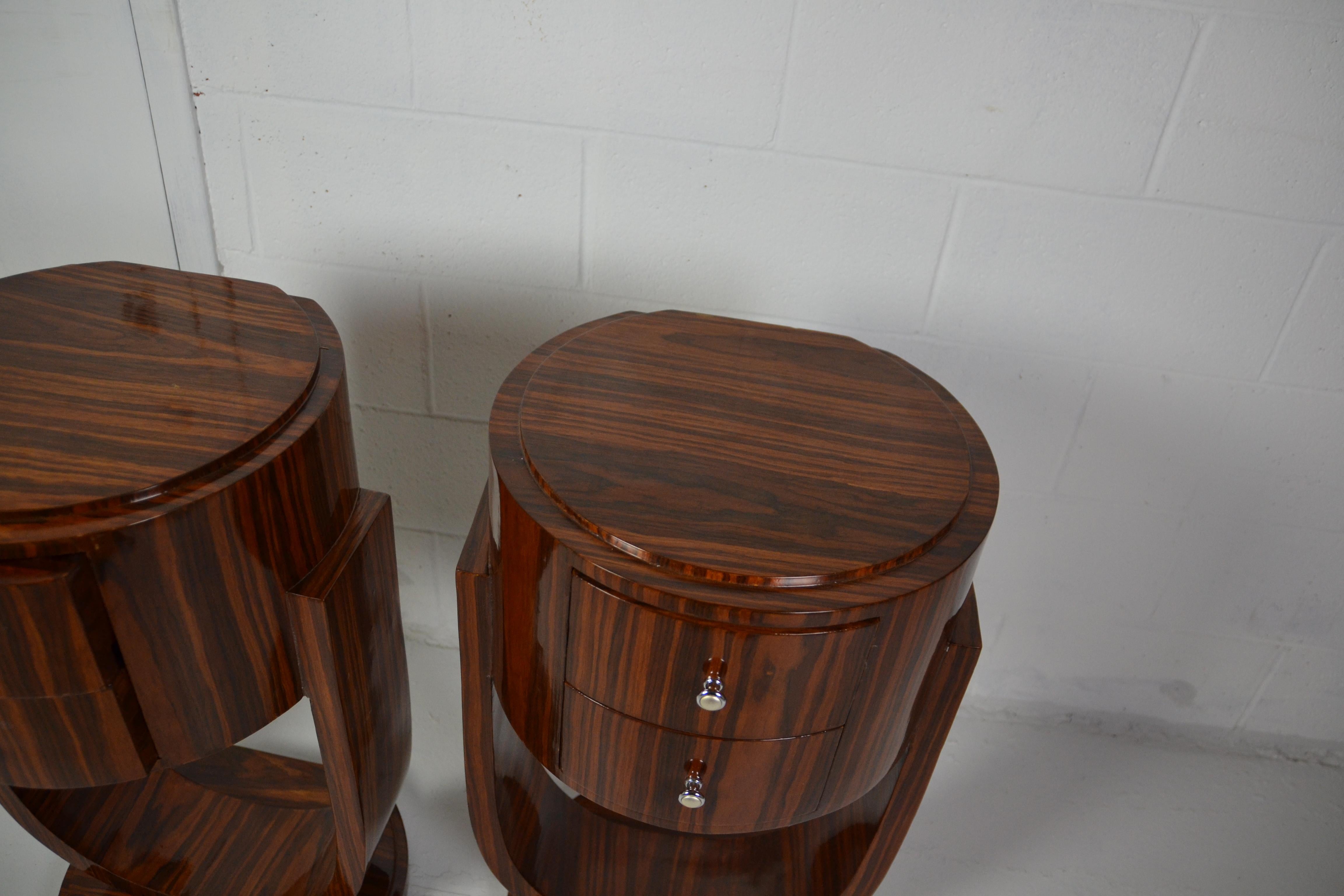 Pair of two drawers rosewood Art Deco style nightstands or end tables.