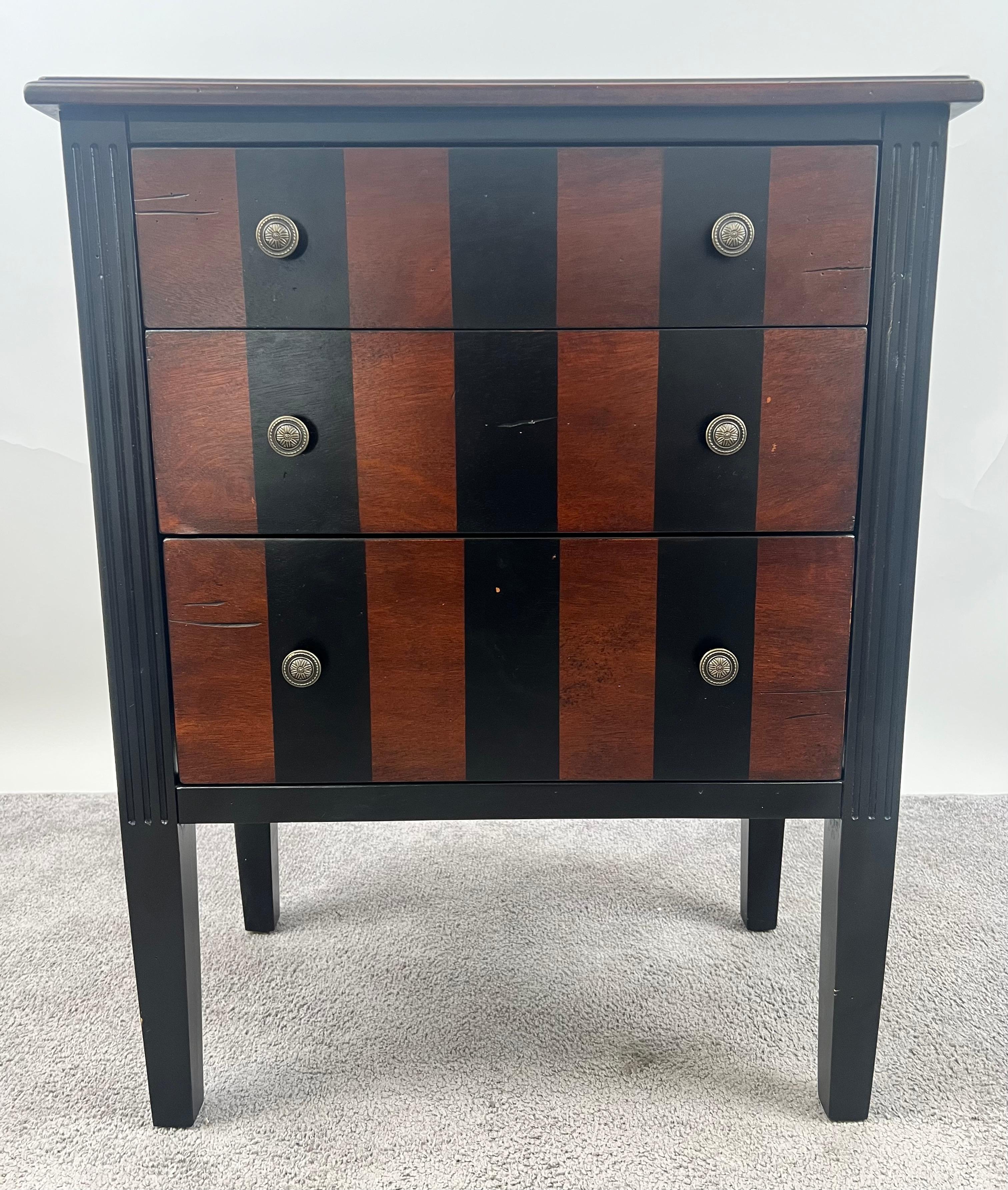 Art Deco Style Rosewood Three - Drawers Nightstand, End Table or Chest 

This Art Deco style  single nightstand or chest is a study in streamlined elegance and bold symmetry. Crafted from richly toned rosewood, the piece showcases alternating