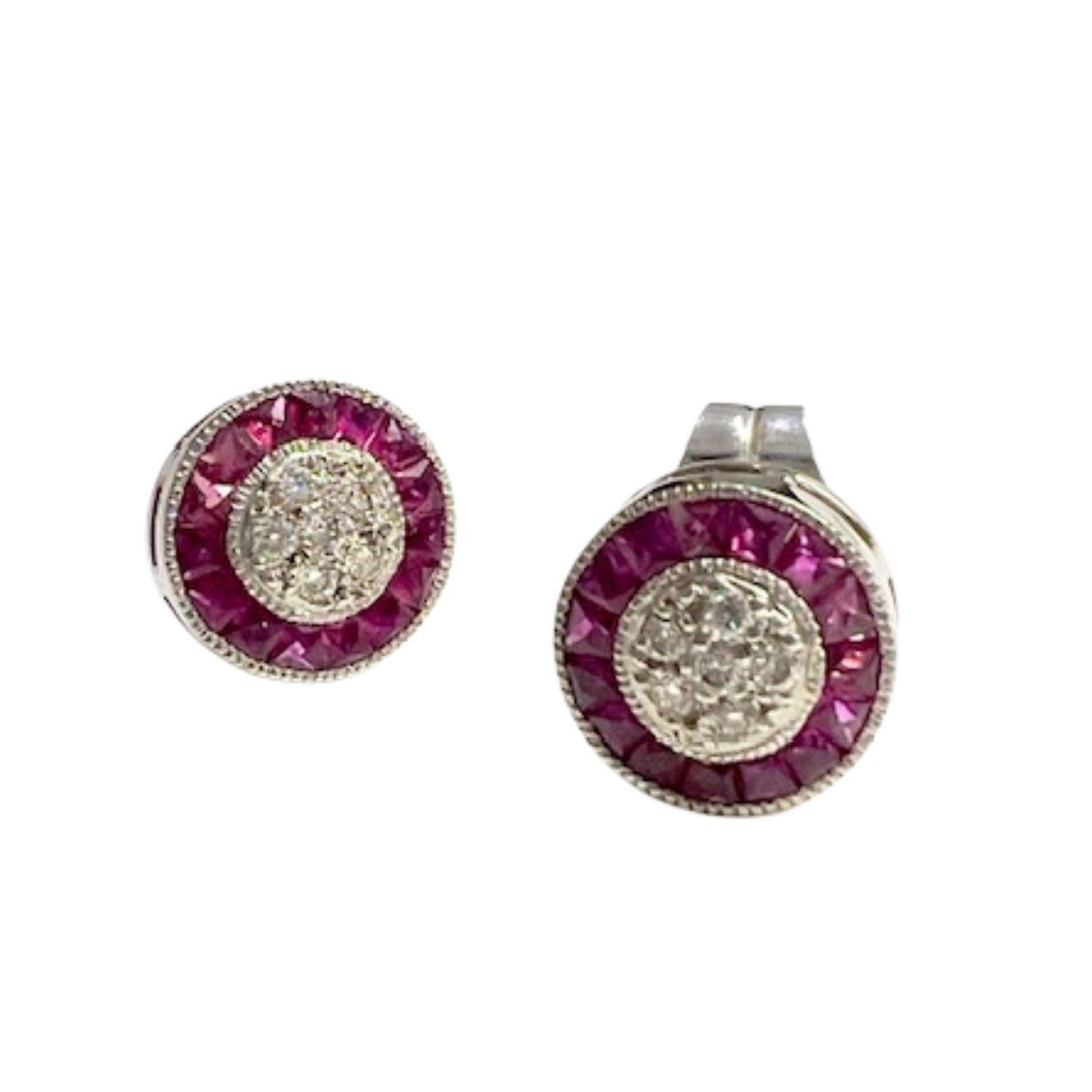 Add a touch of Art Deco elegance with these stunning ruby and diamond stud earrings crafted in white gold 18 kts. With a weight of 4.95 grams and measuring 0.8 x 0.3 cm, these earrings exude sophistication and glamour. 
The brilliant-cut diamonds