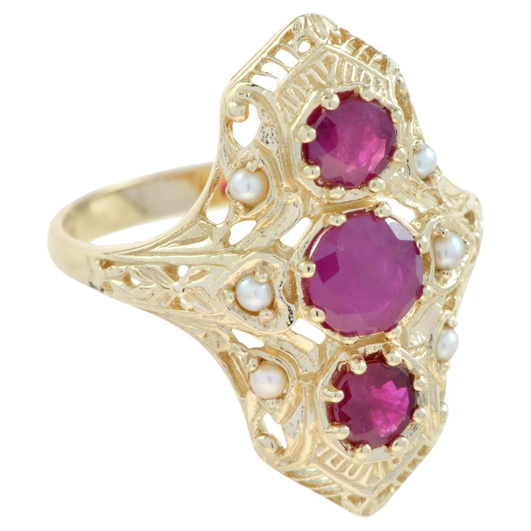 Filigraner Ring im Art-Déco-Stil mit Rubin und Perle aus 14 Karat Gelbgold
