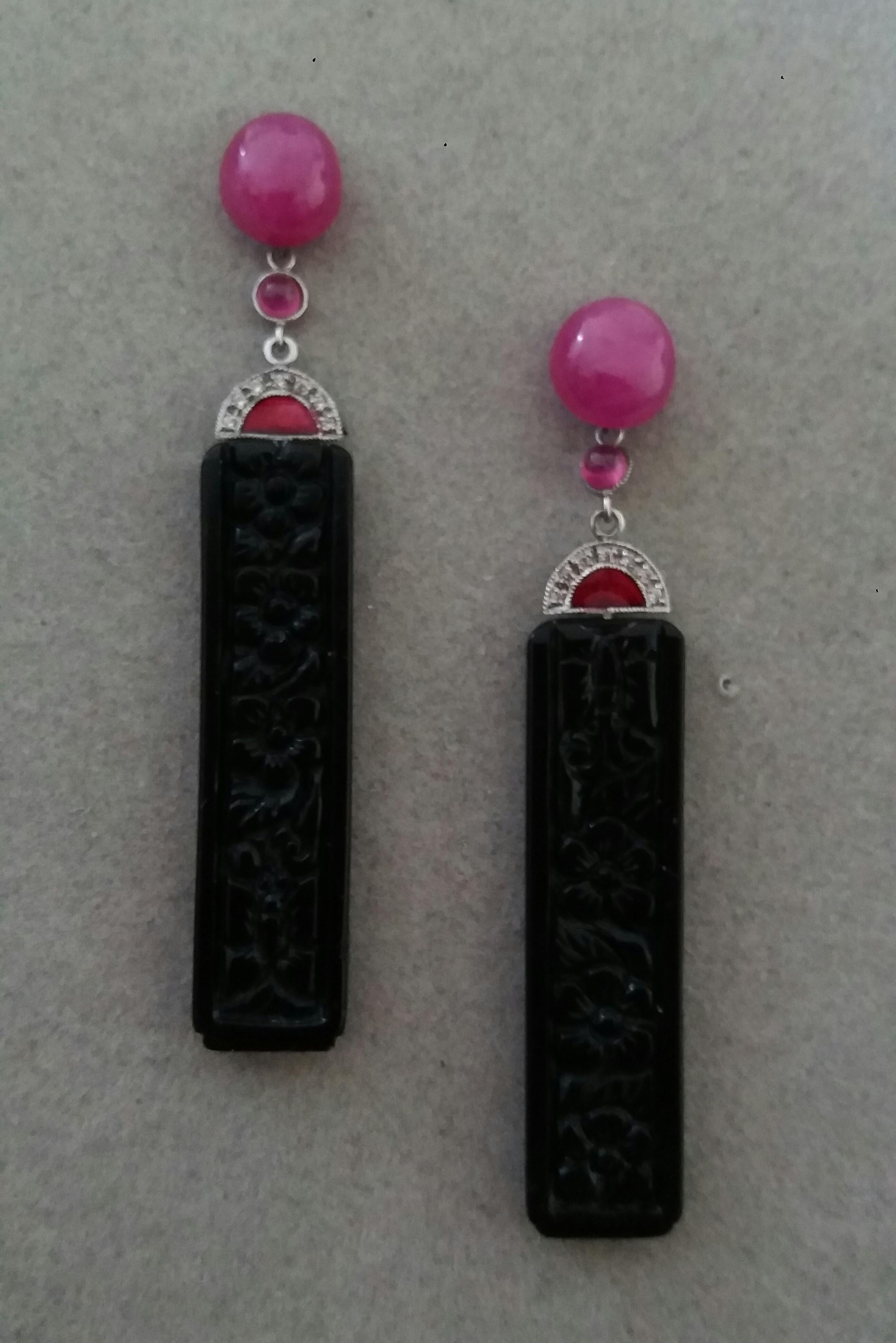 2 Oval Ruby cabs are on top, middle parts  with small Ruby round cabochons,
white gold ,14 round full cut diamonds,red enamel,in the bottom parts we have 2 Carved Black Onyx   rectangular bars measuring 10 x 40 mm.

In 1978 our workshop started in