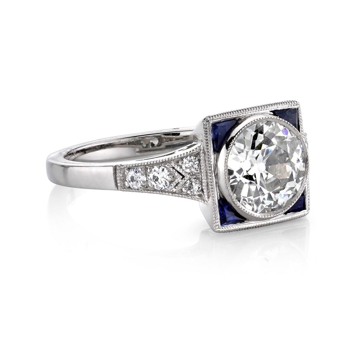 1.45ct K/VS1 EGL certified old European cut diamond with 0.15ctw old European cut diamond accents and 0.17ctw French cut sapphire accents set in a handcrafted platinum mounting. 

Ring is currently a size 6 and can be sized to fit. 
