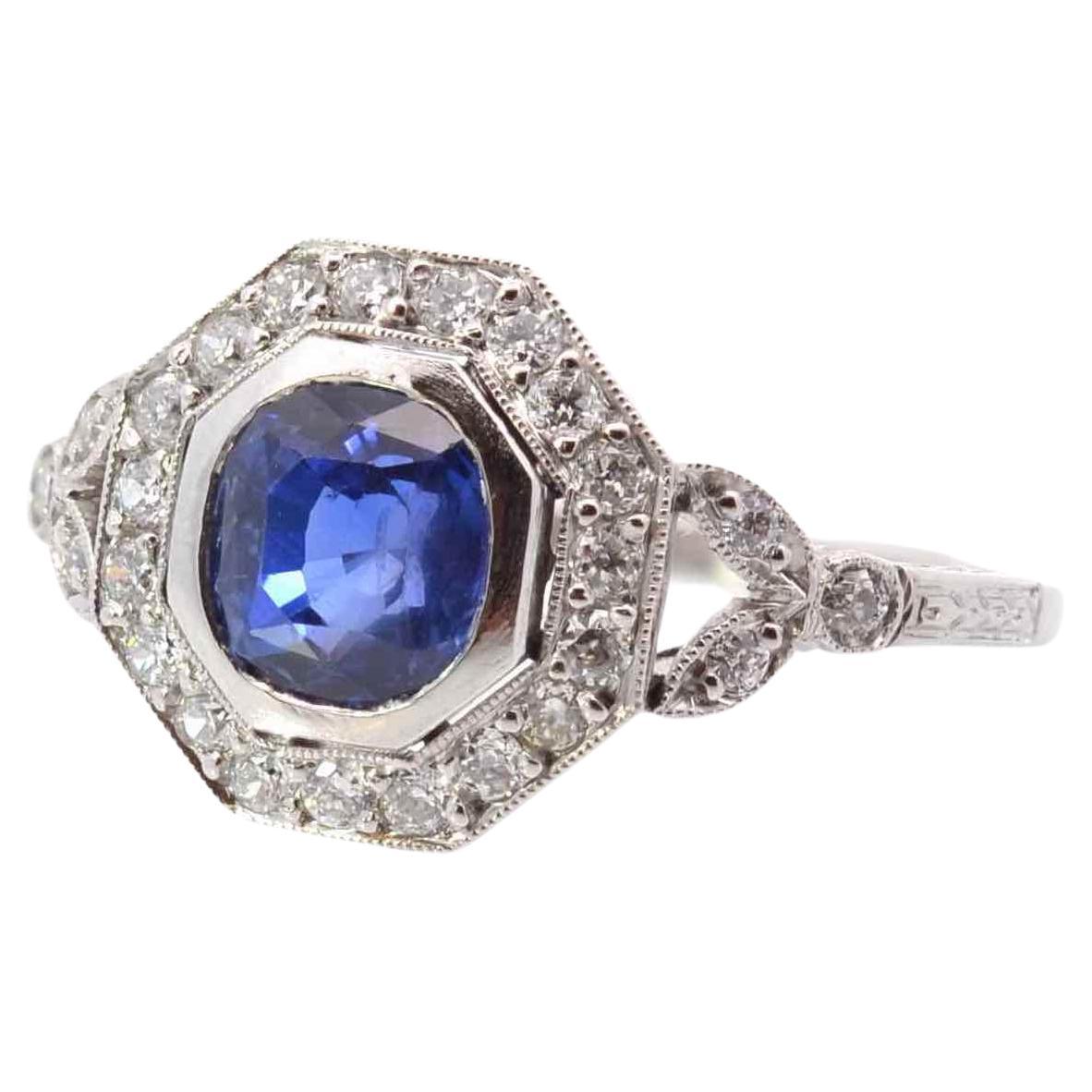 Art déco style sapphire and diamonds ring in platinum For Sale