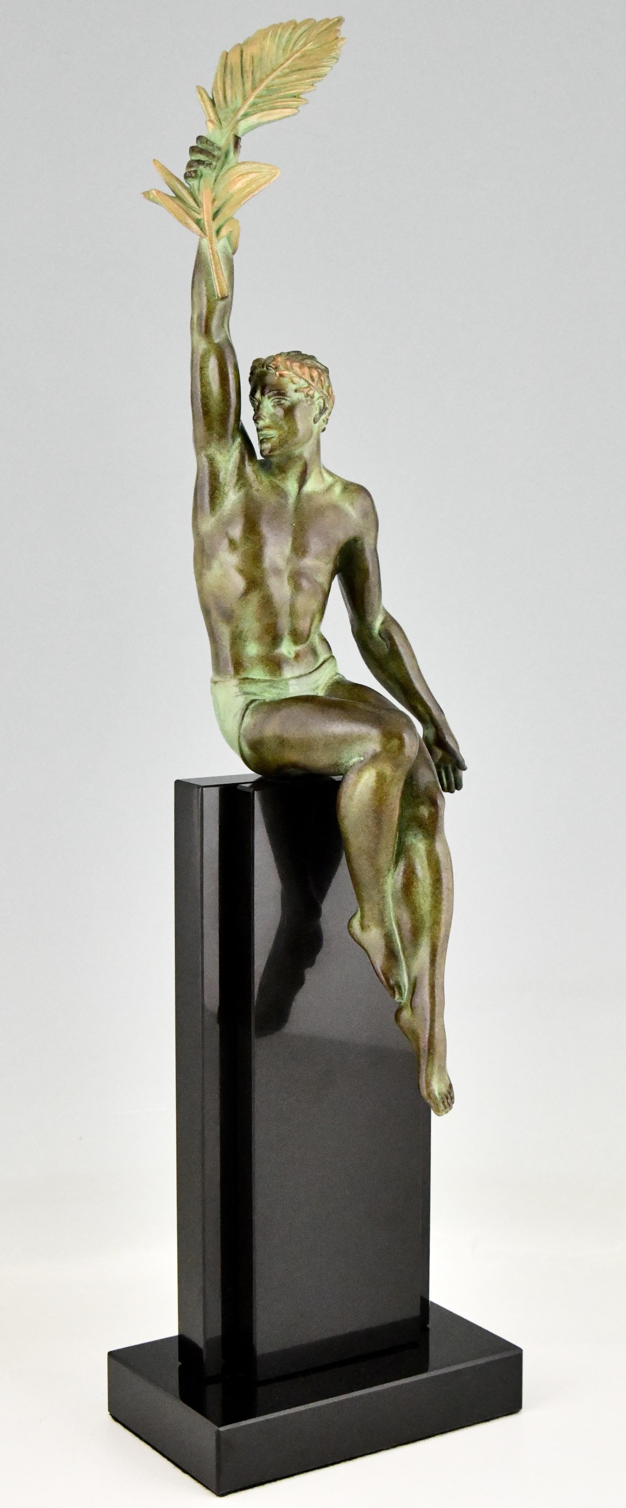 Victory, Art Deco sculpture designed by Pierre Le Faguays ca. 1930. 
Seated man holding a palm leaf. 
Patinated Art metal on a black marble base. 
Contemporary cast at the Max Le Verrier foundry in Paris. 
With foundry seal.