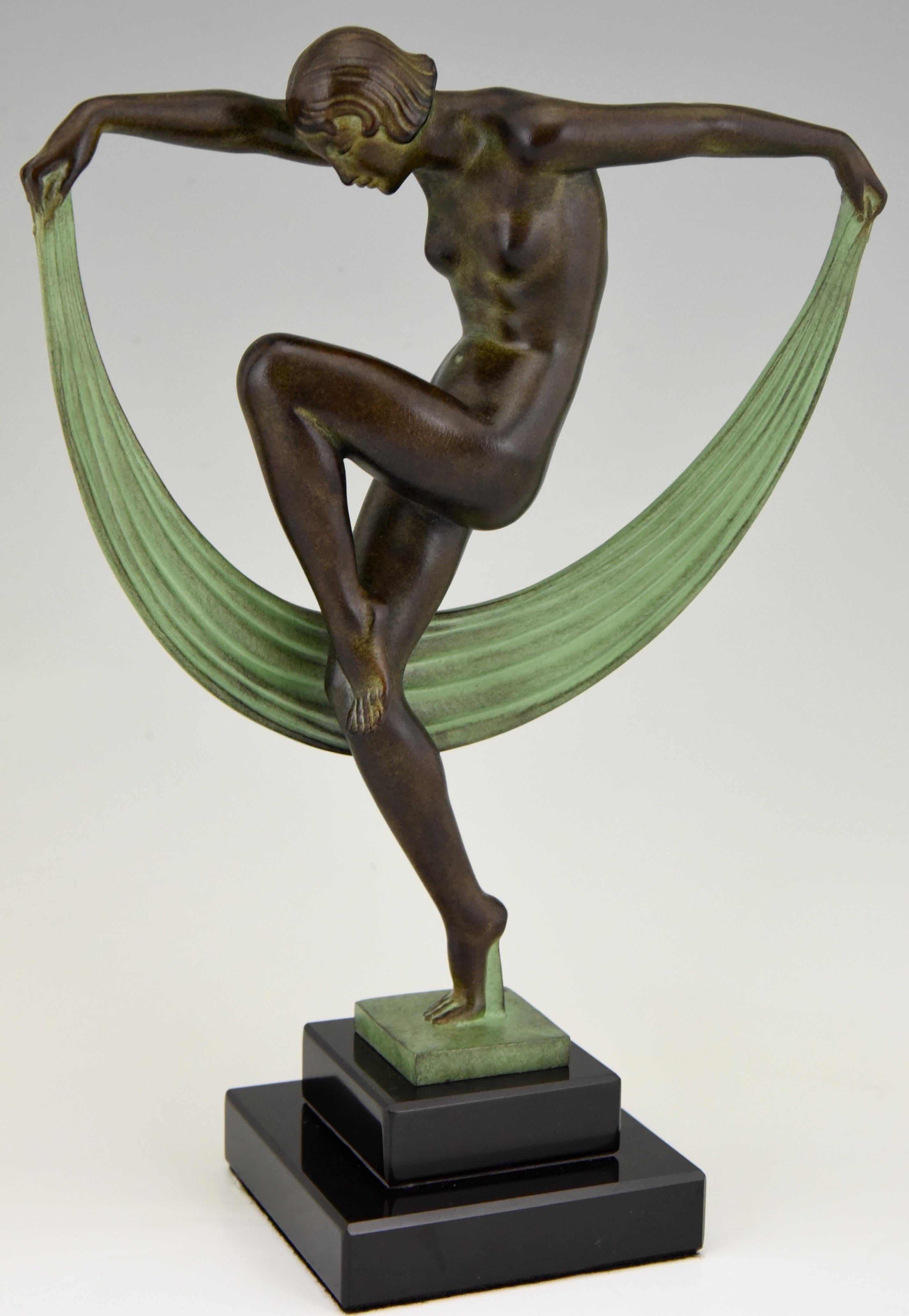 Elegant sculpture in Art Deco style, ball dancer signed by Denis. 
With foundry mark. 
Cast at the Max Le Verrier foundry. 
Designed ca. 1930. 
Posthumous contemporary cast. 
Patinated Art metal on a stepped black marble base. 
With certificate of