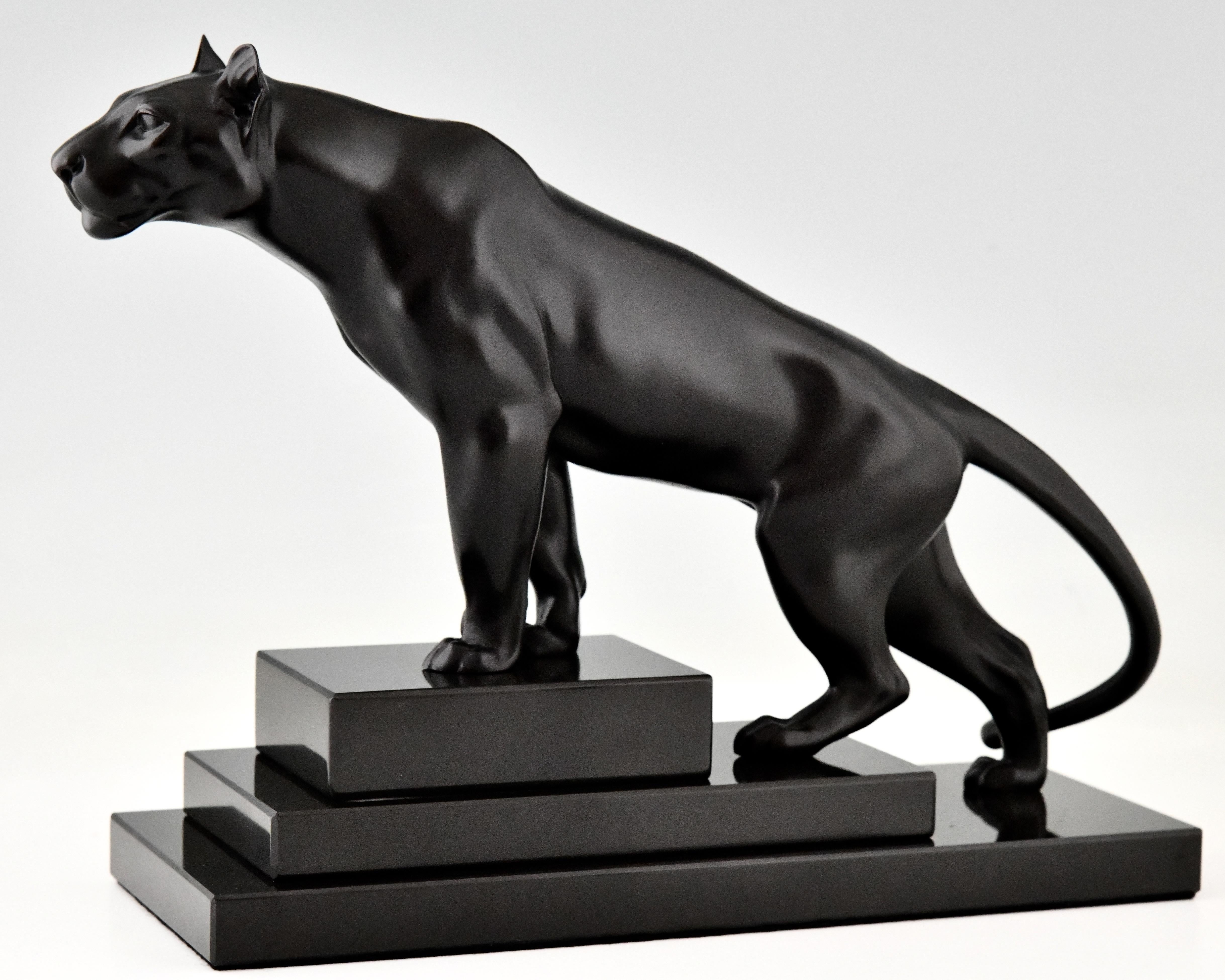 Art Deco style sculpture of a black panther on a stepped marble base by the French artist Max Le Verrier, France. 
With foundry mark. 
Design 1930. Posthumous contemporary cast. 
Handcrafted.  
With Certificate of Authenticity.

Literature on Max Le